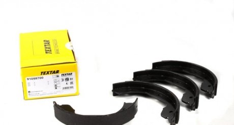 Комплект тормозных колодок, стояночная тормозная с TEXTAR 91058700 (фото 1)