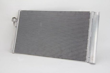 Радиатор кондиціонера THERMOTEC KTT110051 (фото 1)